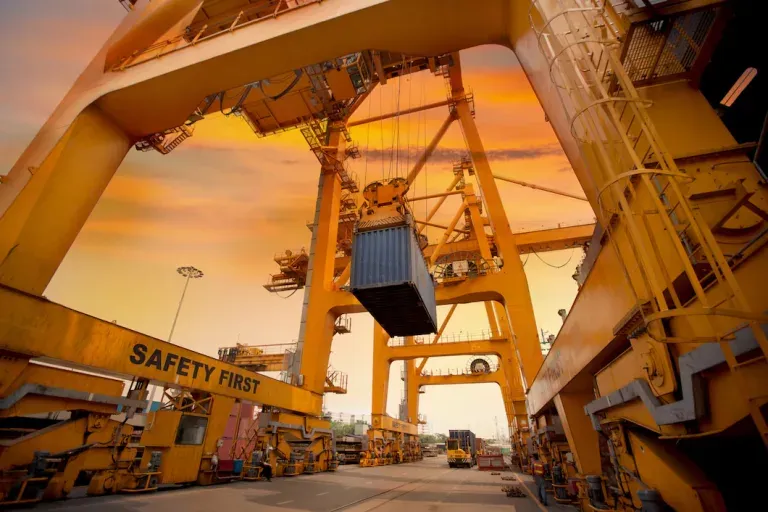 Cargo being lifted by machinery